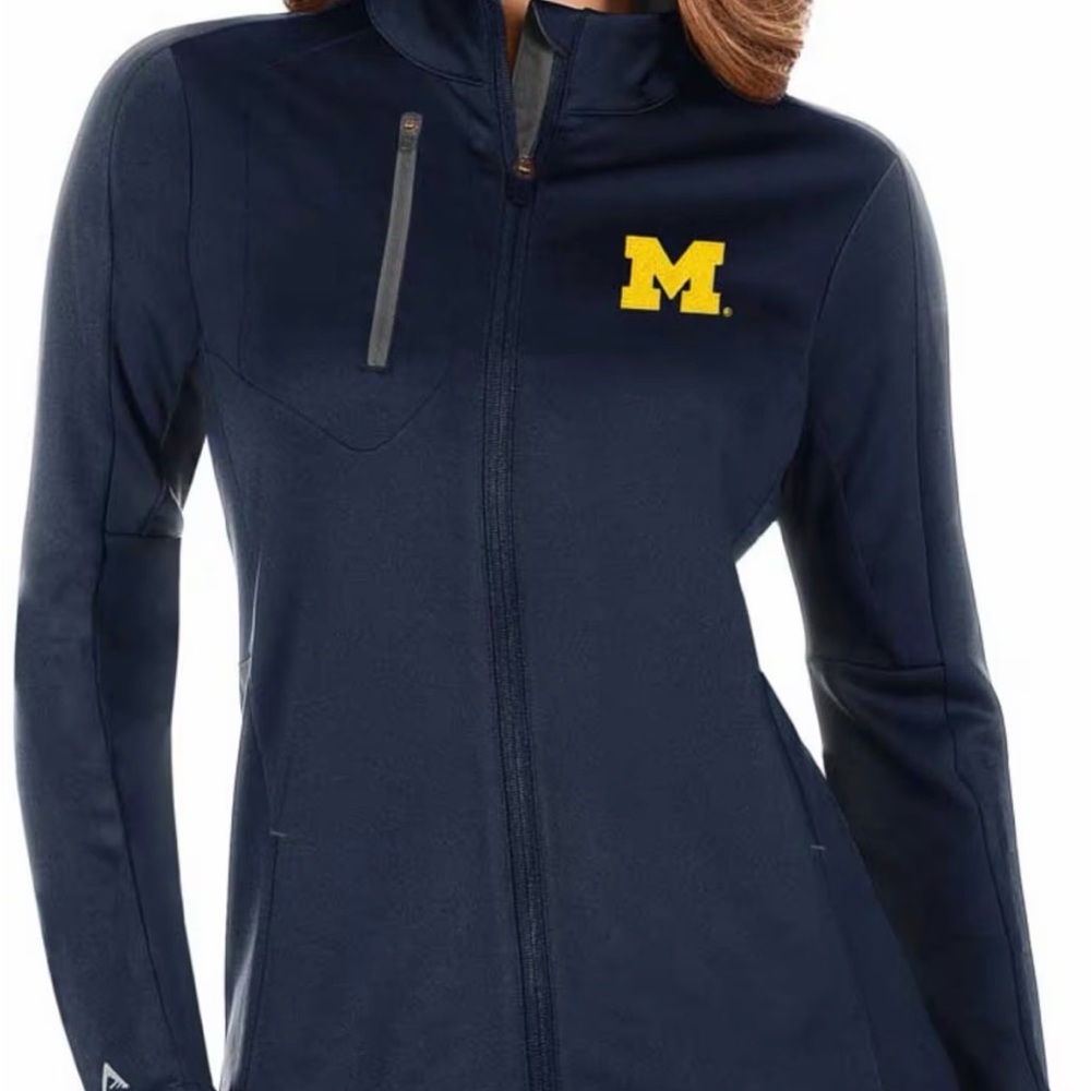 MICHIGAN WOLVERINES  | antigua. - water resistant Navy Jacket with logo